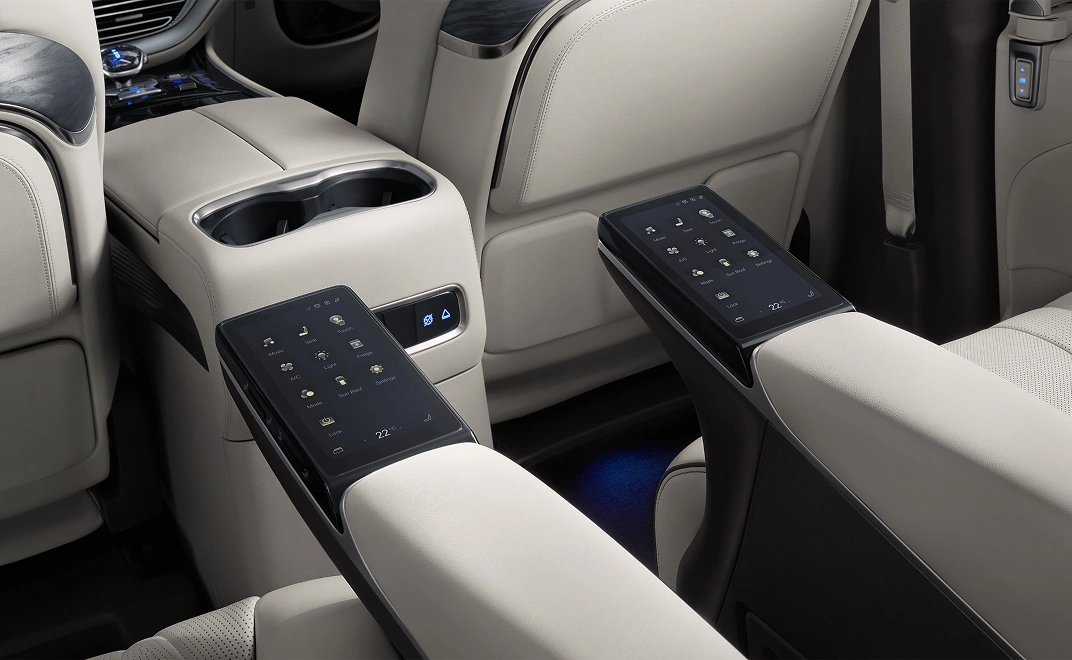 denza-d9-interior-mid-row-seats-tables-screens